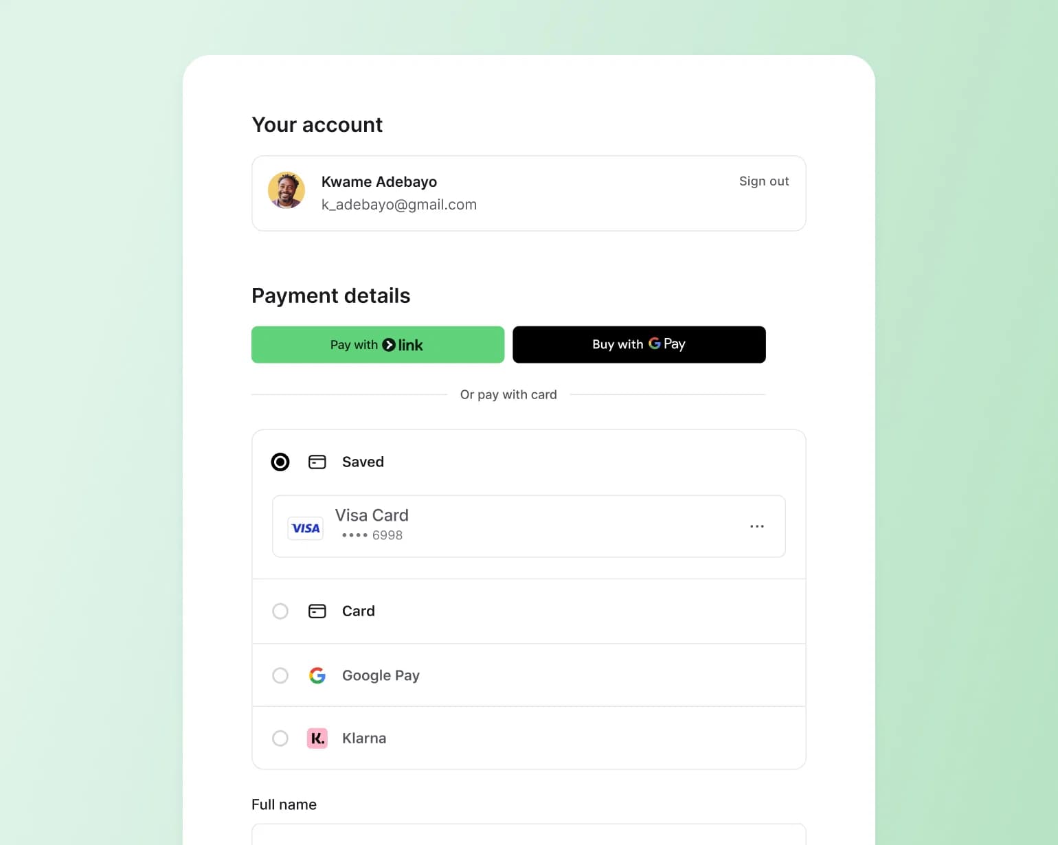 Payment checkout page showing account details for Kwame Adebayo with multiple payment options including Link, Google Pay, saved Visa card ending in 6998, and Klarna