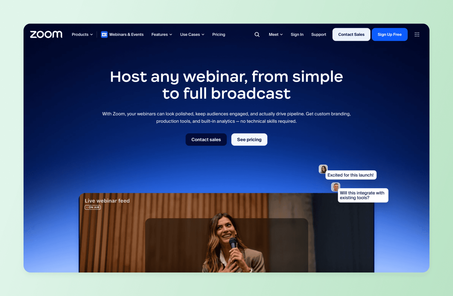 Zoom webinar platform homepage showing speaker with microphone presenting to live audience with chat messages and On Air indicator
